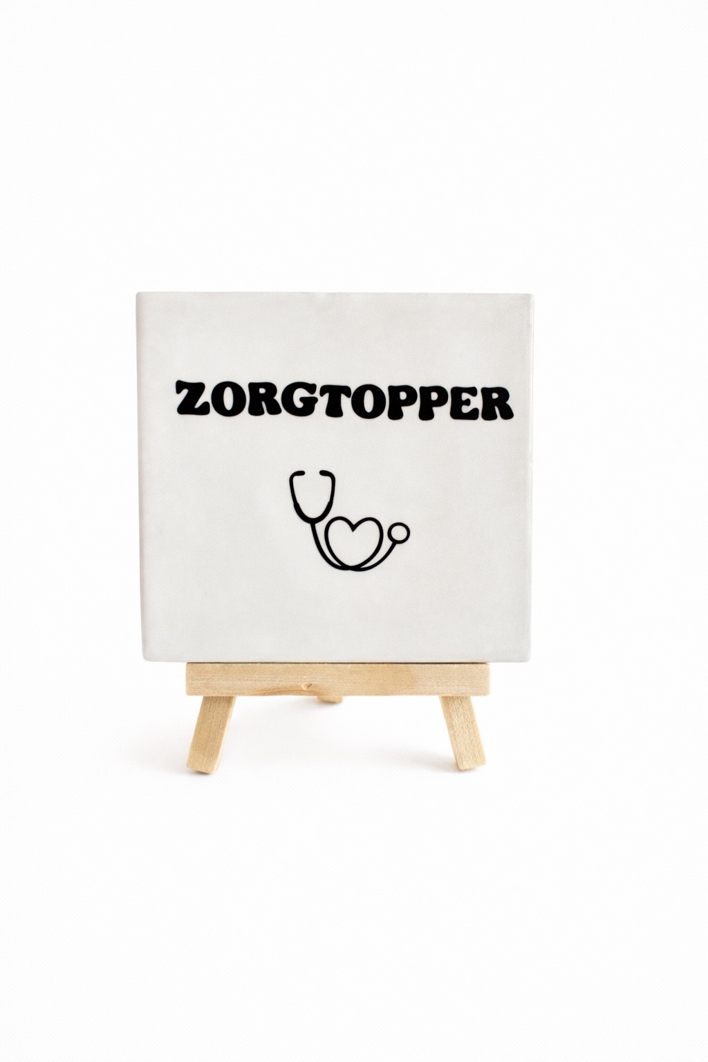 Tegel met tekst: zorgtopper